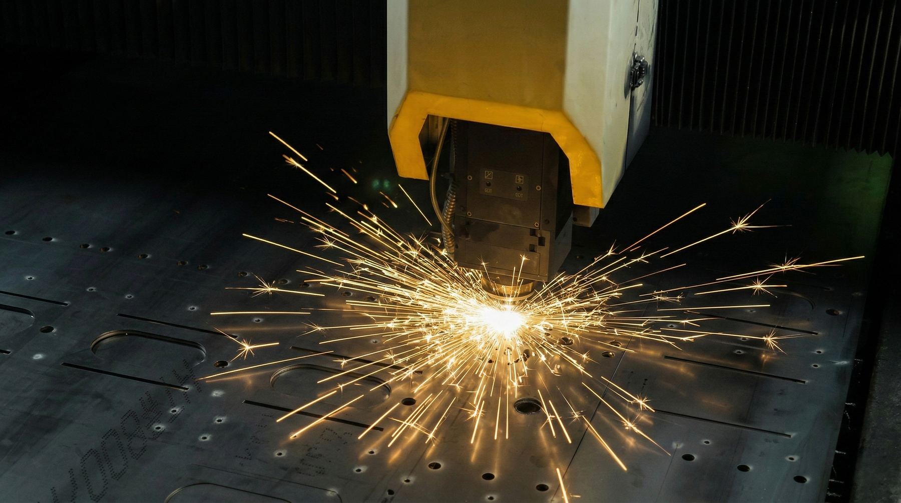 Fiber laser cutting steel plate with sparks